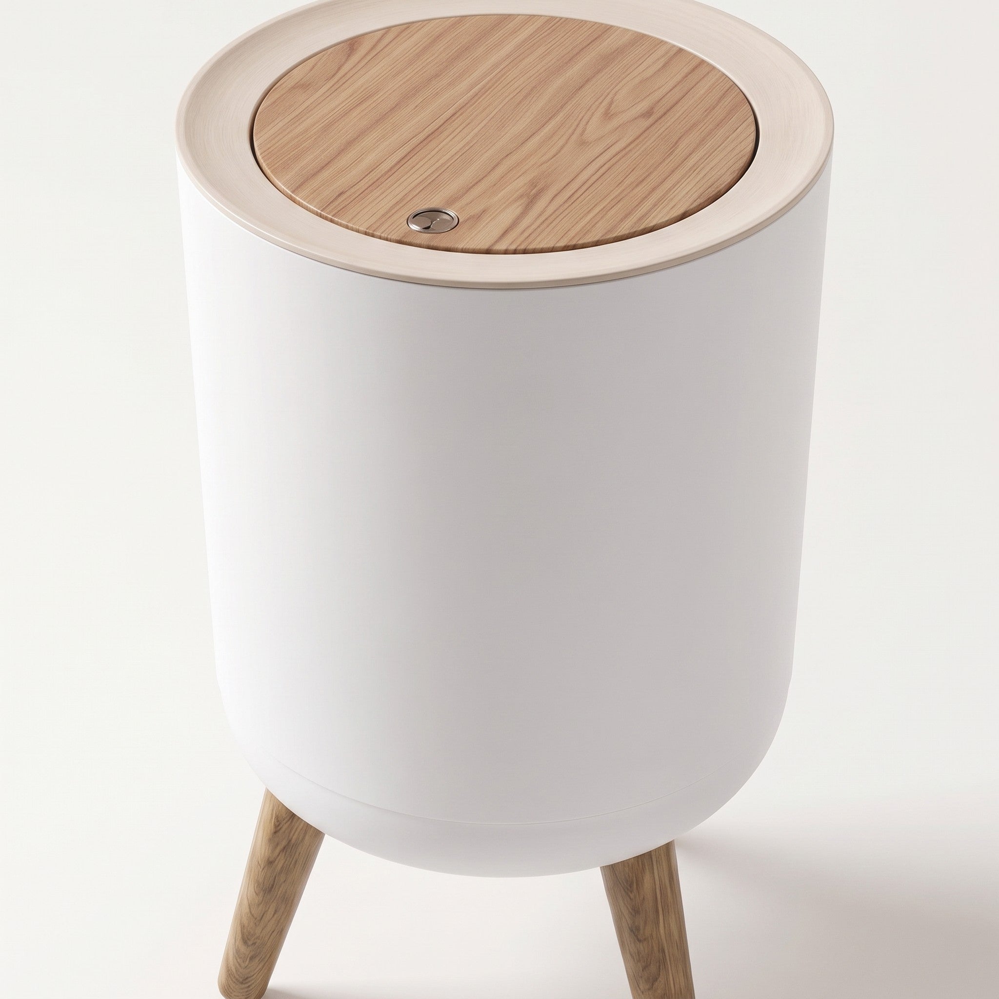 Close detail of the trash can's press-open lid and elevated legs