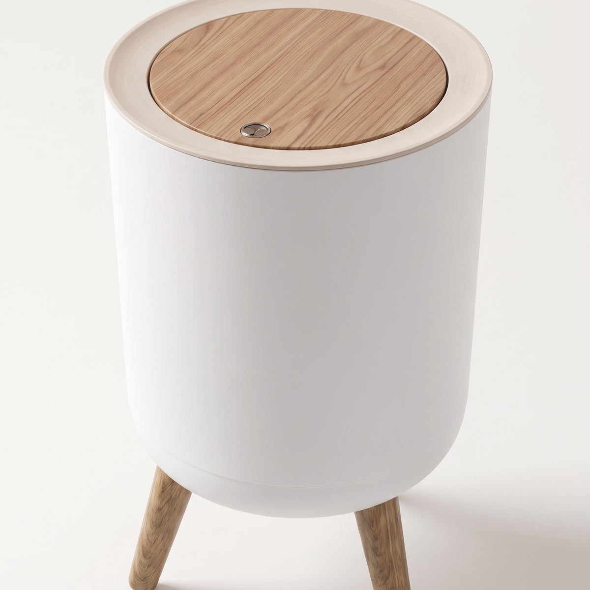 Close detail of the trash can's press-open lid and elevated legs