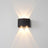Up-down wall light, 4-light version, lit on a wall