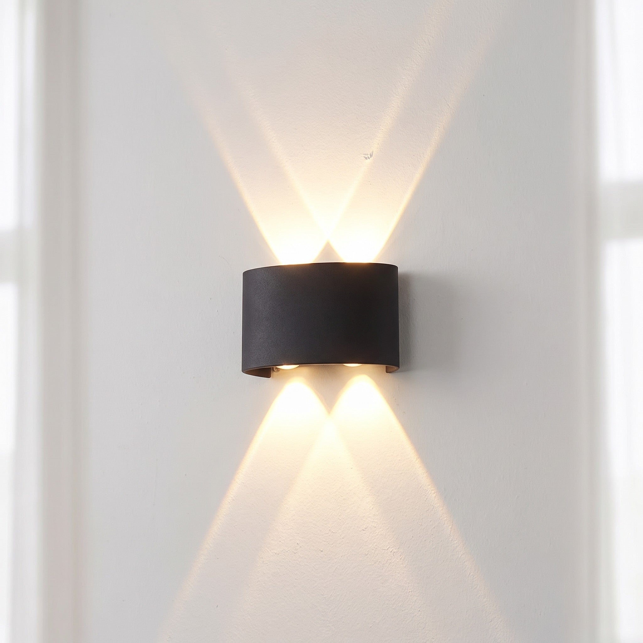 Up-down wall light, 6-light version, lit on a wall