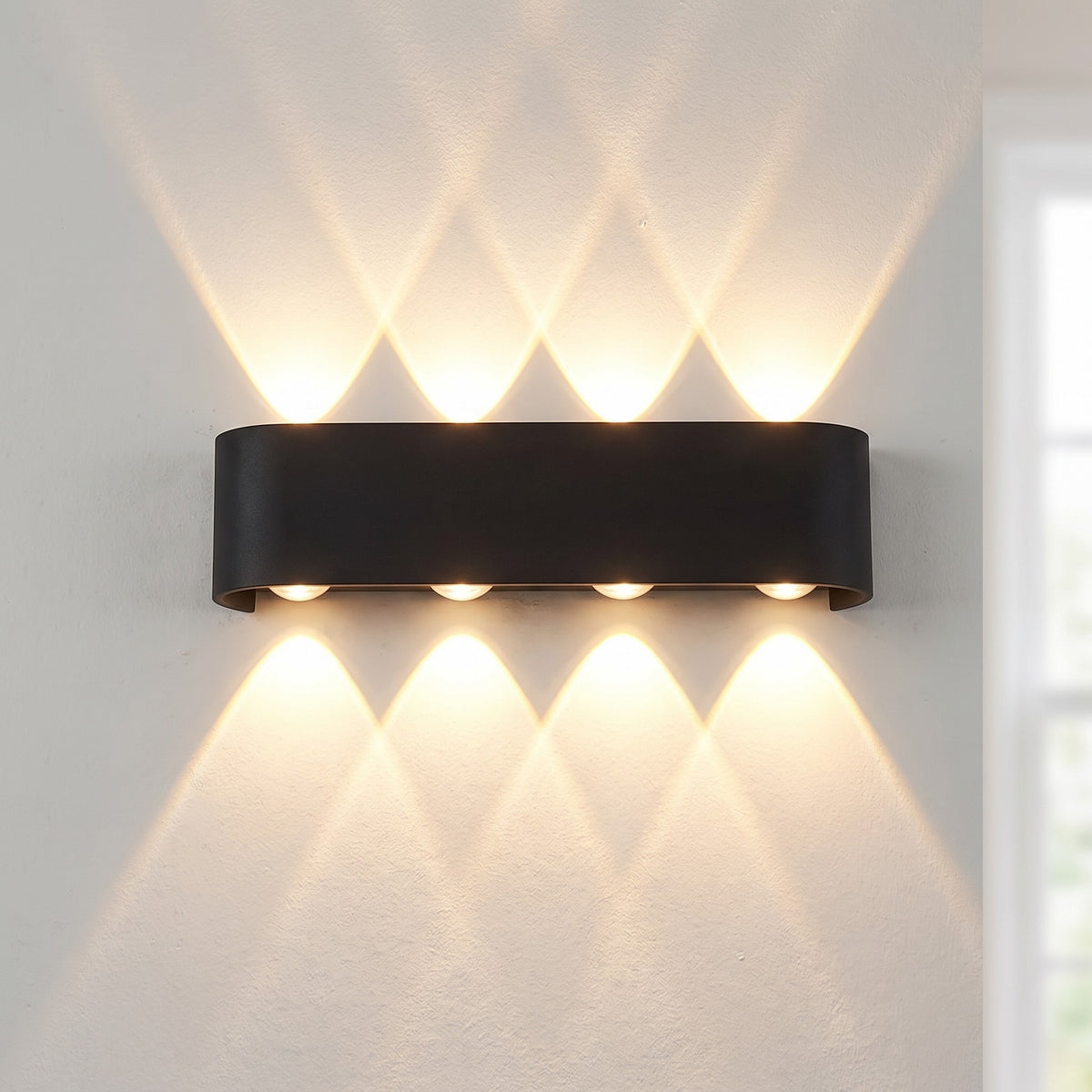 Up-down wall light, 8-light version, lit on a wall