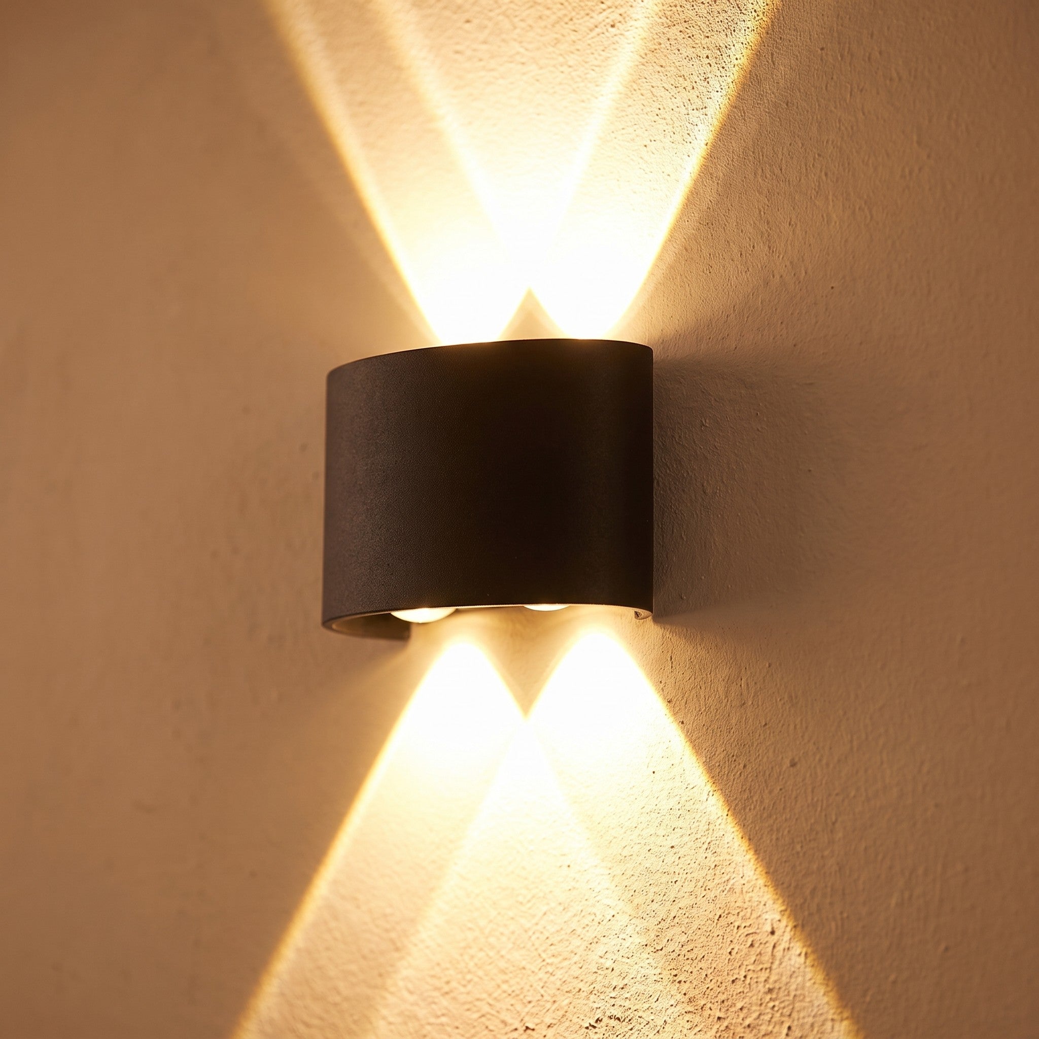 Close detail of the up-down wall light with beams leaving top and bottom