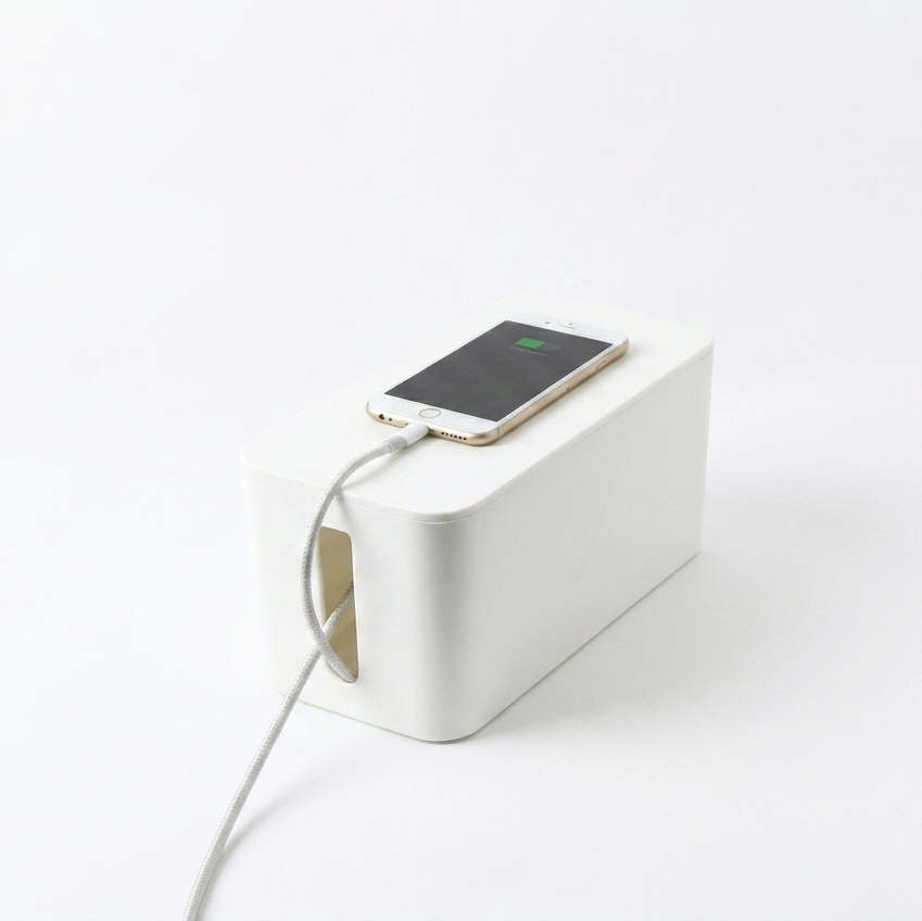 White cable management box, white background