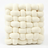 Chunky knit accent pillow in cream, white background