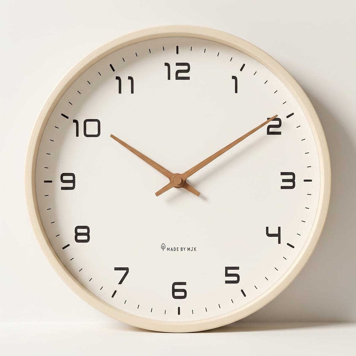 Wood Frame Silent Wall Clock with a cream wood frame, shown straight on against an off-white studio backdrop.