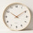 Wood Frame Silent Wall Clock with a cream wood frame, shown straight on against an off-white studio backdrop.