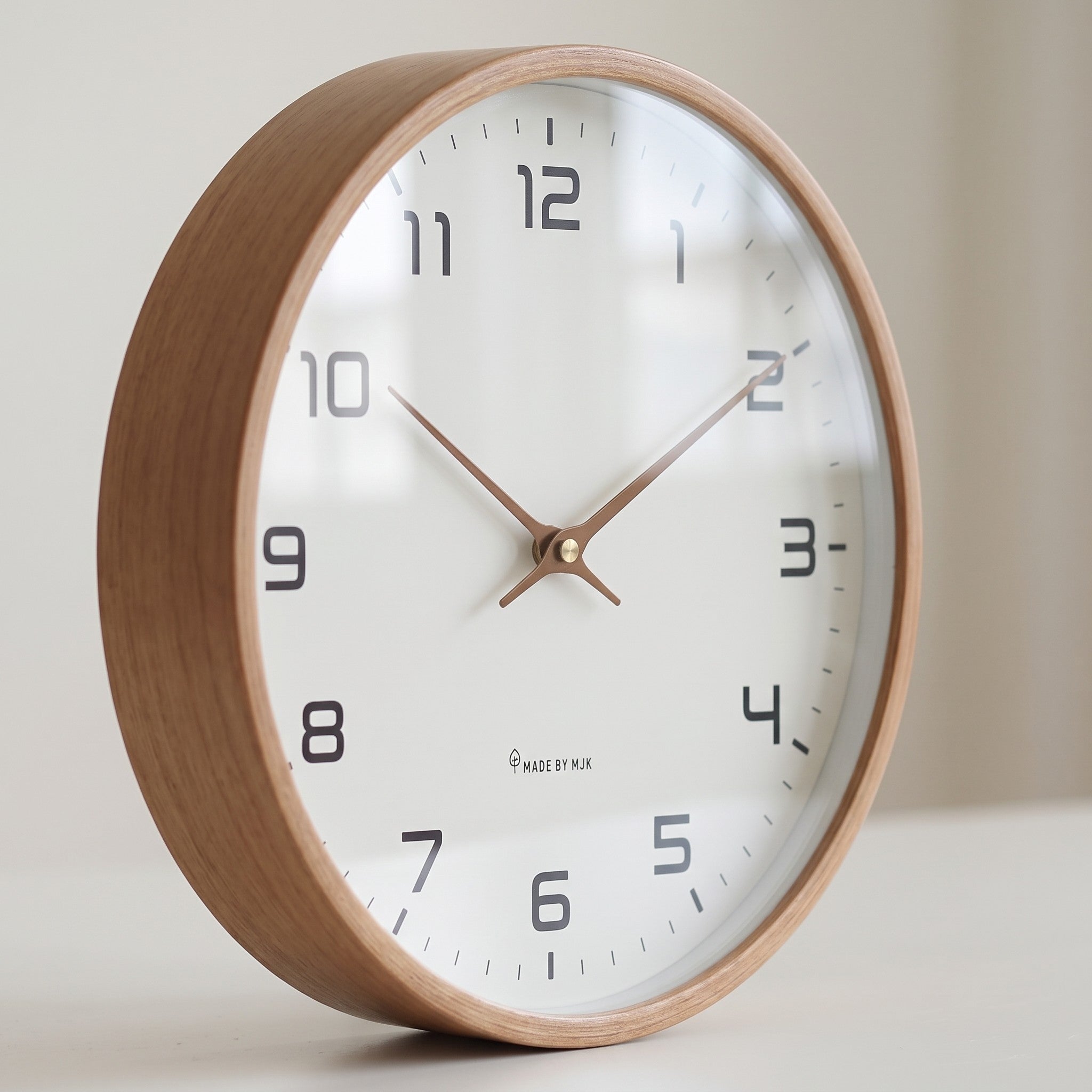 Close-up of the Wood Frame Silent Wall Clock, showing the depth of the brown wood frame and the glass front over the dial.