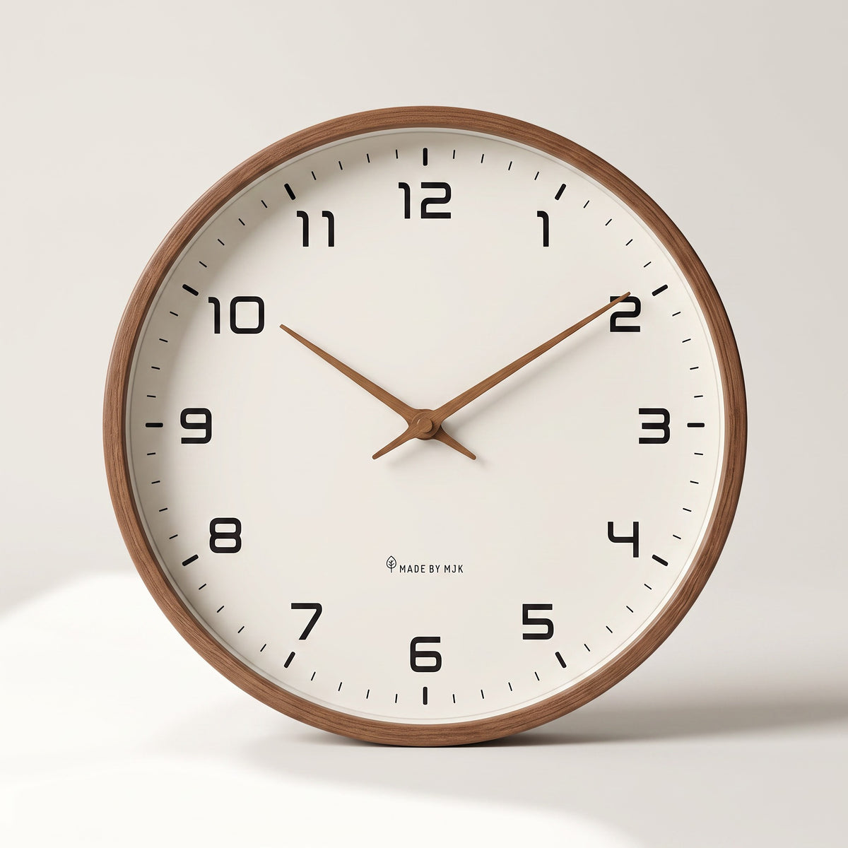 Wood Frame Silent Wall Clock with a brown wood frame, shown straight on against an off-white studio backdrop.